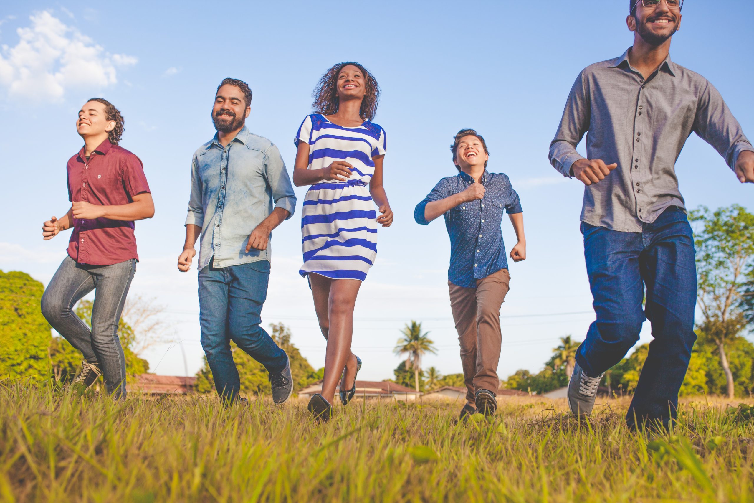 Group of members excitedly walking towards something.